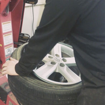 eden prairie mechanic changing tire